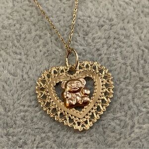 14k. Rose teddy bear and yellow gold heart shaped charm and about 18’’ necklace.